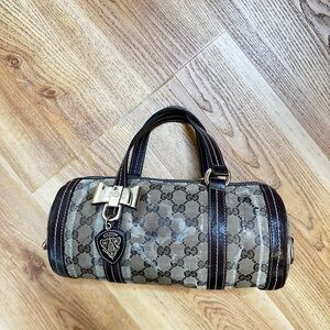 Gucci GG Canvas Barrel Bag with Dark Leather Trim